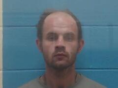 Mugshot of MOORE, JOSHUA A